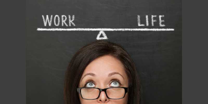 IS Work-Life Balance a Myth - woman with a balance beam over her head with Work on one side and Life on the other